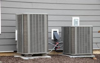 two air conditioner units outside